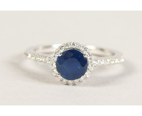 AN 18CT WHITE GOLD, SAPPHIRE AND DIAMOND RING of 1.4cts.