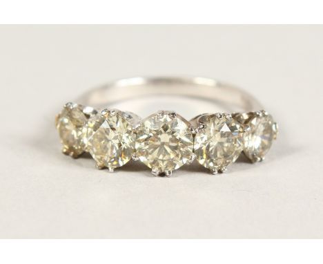 AN 18CT WHITE GOLD FIVE STONE DIAMOND RING of 3.34cts.