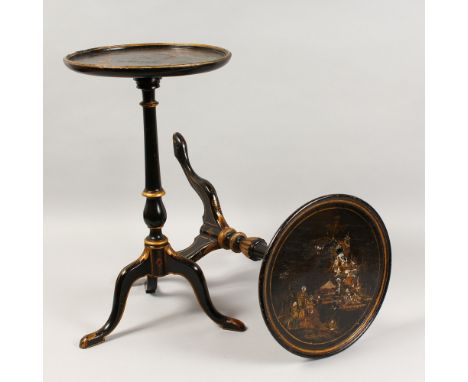 TWO CHINOISERIE DECORATED BLACK LACQUER TRIPOD TABLES. 1ft 8ins high x 1ft 0ins diameter.