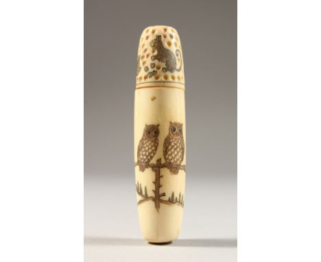 AN ETCHED BONE THIMBLE CASE, engraved with owls. 5.25ins long.