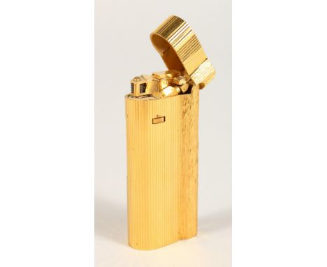 A DUNHILL GILT LIGHTER, No. 070629.
