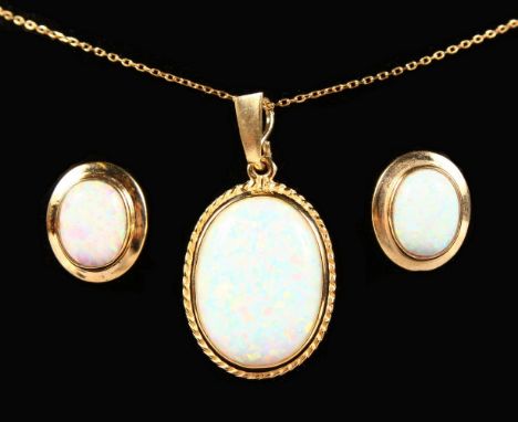 A 9CT GOLD GILSON OPAL PENDANT AND CHAIN and EARRINGS.