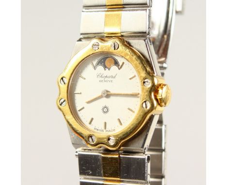 A CHOPARD ST MORITZ WATCH, in a gold and steel case.