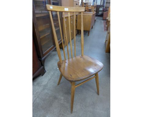 An Ercol Blonde elm and beech 608 model chair 