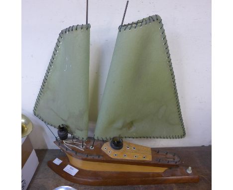 A teak sailing boat lamp 