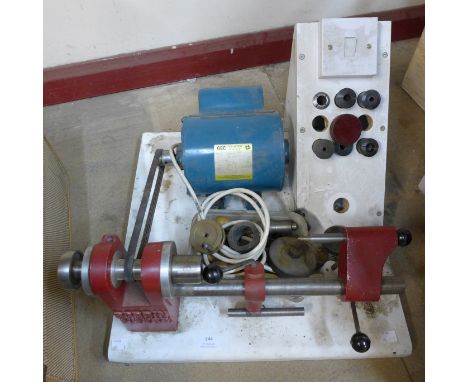 A bobbin maker lathe and accessories 