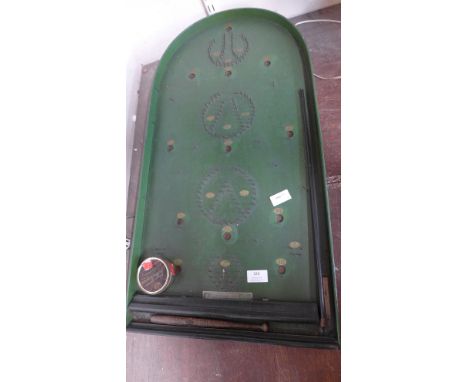 A vintage bagatelle board 