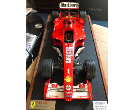 Signed model of Ferrari F2004 at Bahrain in April 2004.The Ferrari F2004 is one of the most successful cars in Formula One hi