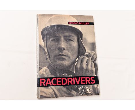 Gifted to the vendor by Stirling Moss.1st Edition (1963) still with original dust cover and in fantastic condition.With a han