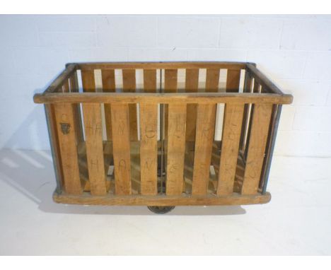 An industrial wooden slatted bobbin trolley - from Axminster Carpets, length 133cm, depth 67cm, height 86cm.