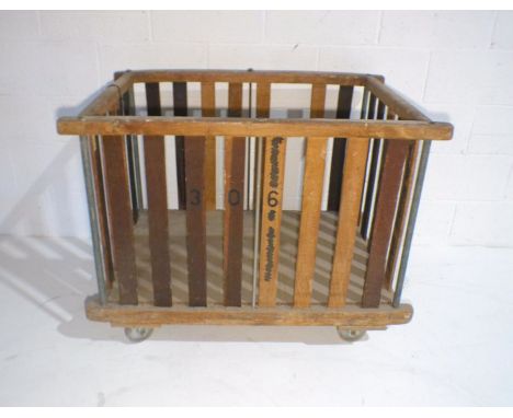 An industrial wooden slatted bobbin trolley, one slat missing - from Axminster Carpets, length 106cm, depth 69cm, height 83cm