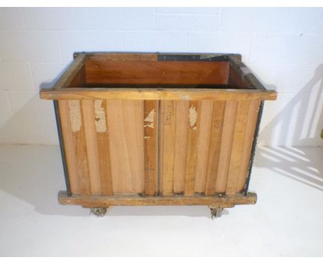 An industrial wooden slatted bobbin trolley - from Axminster Carpets, length 109cm, depth 71cm, height 82cm.