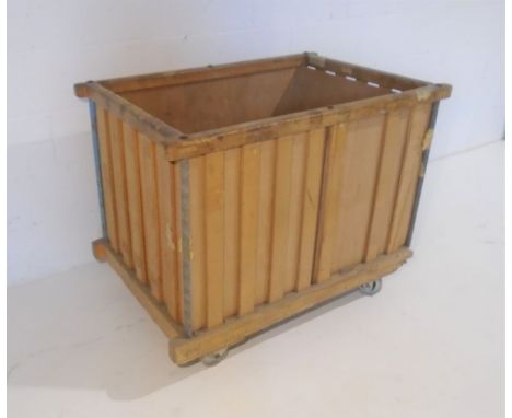 An industrial wooden slatted bobbin trolley - from Axminster Carpets, length 107cm, depth 70cm, height 84cm.