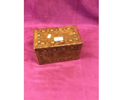 A Victorian walnut and inlaid two compartment tea caddy