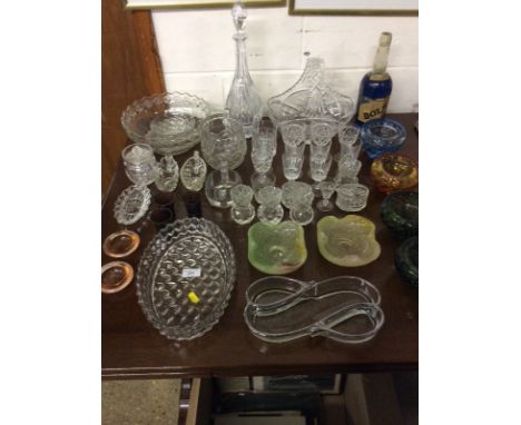 A quantity of various glassware to include four bubble glass bowls; various drinking glasses; a decanter and stopper etc.