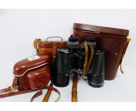 A vintage Kodak colour snap 35 Model.2 camera, together with two pairs of binoculars, (3) 