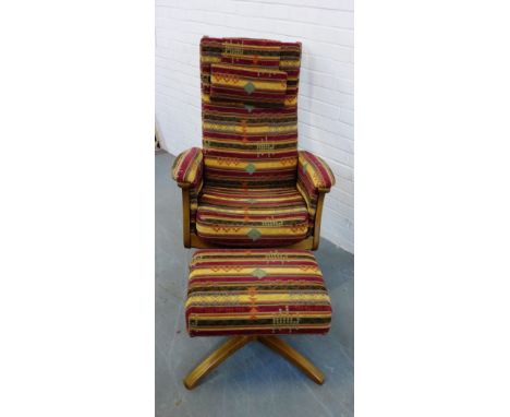 An Ercol 'Gina' recliner armchair and matching footstool, 115 x 75cm, (2) 