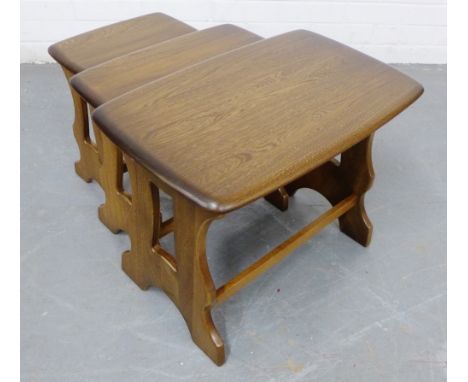 An Ercol 'Chantry' range nest of three tables, 57 x 42cm