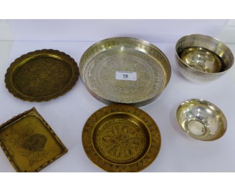 A mixed lot to include Middle Eastern white metal to include a foliate engraved card tray, a small bowl and two circular salt