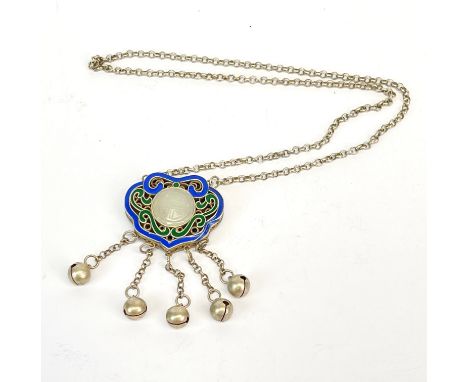 A Sino-Tibetan white metal enamelled pendant inset with carved jade, pendant W. 5cm.