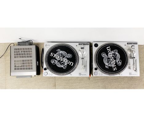 Two Stanton STR8-60 record turntables and a Denon compact disc player.