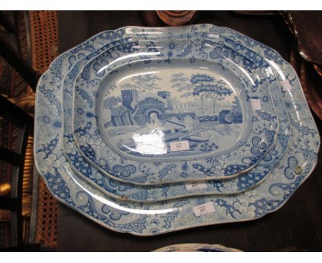 A graduated set of three Spode blue and white transfer decorated meat platters in the 'old italian pattern' (3)  