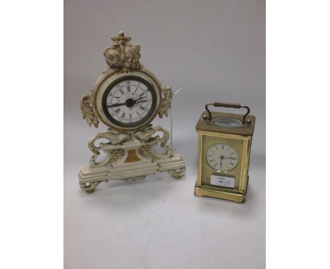 A French carriage timepiece with key, together with an alarm clock in easel backed iron rococo case (2)  