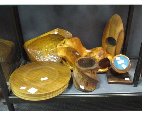 A quantity of woodwork, to include plates, carvings, coasters etc 