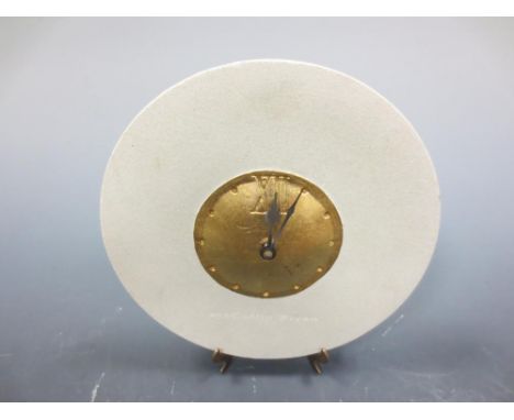 A gold leaf and stone clock by McCollin Bryan  