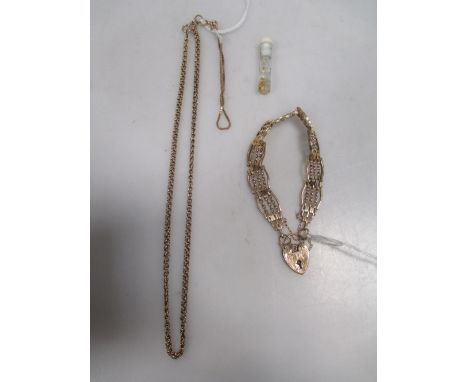 A gate bracelet with heart shaped padlock clasp hallmarked for 9ct gold, 17.8g together with a yellow metal chain with clasp 