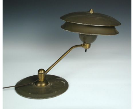 An American enamelled desk lamp, the grey enamelled two-tier shade to an angled brass arm and spreading circular base, number