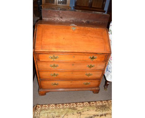 George III faded mahogany bureau with fall front opening to a shelved interior over four long drawers and bracket feet, 89cm 