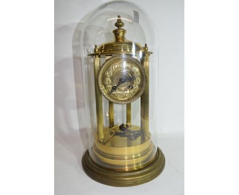 Late 19th/early 20th century French mantel clock with circular face with Arabic numerals to a twin train movement striking on