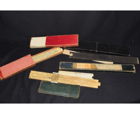 Collection of slide rules and other items to include Unique Universal 2 slide rule, Unique Universal slide rule, Unique Brigh
