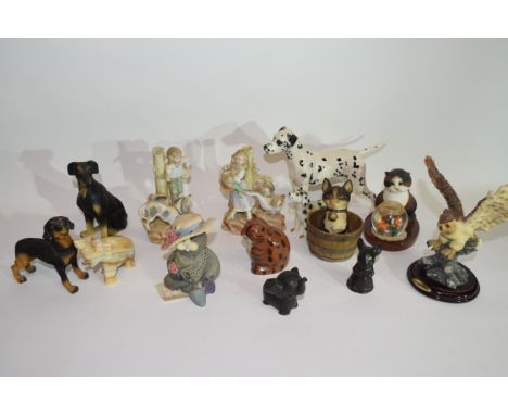 Group of ceramic sculptures of dogs and cats including a Beswick model of a Dalmatian and other models (qty)