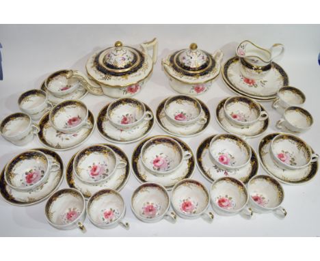 19th century English porcelain tea set, possibly Derby, decorated to the interior with a blue border and gilt design and flor