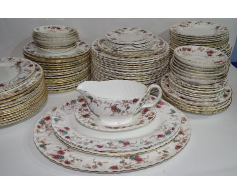 An extensive dinner service by Minton in the Ancestral pattern comprising several hundred pieces of dinner plates, side plate
