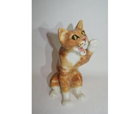 Winstanley type model of a cat with glass eyes, indistinctly signed to base