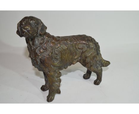 Late 19th/early 20th century bronzed metal model of a dog, 17cm high