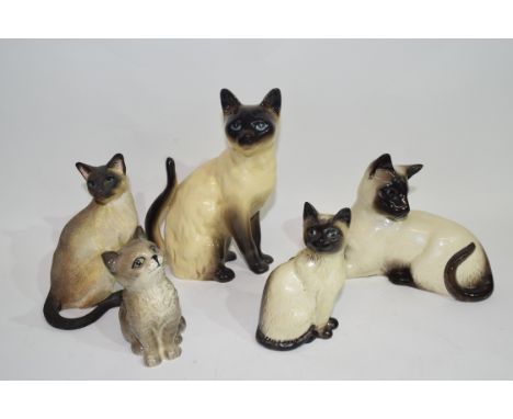 Group of ceramic models of cats by Beswick and others, mainly Siamese (qty)