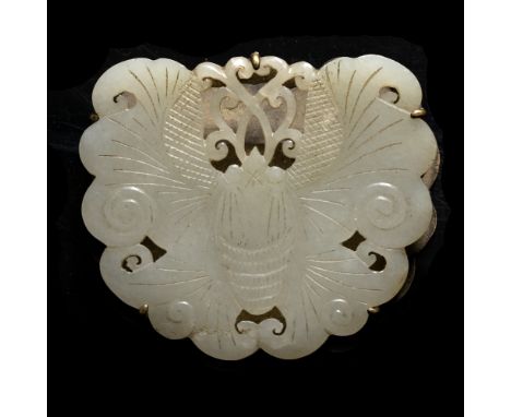 A Chinese greyish white jade pendant 19th Century pierced and carved to a butterfly with entwined feelers and mounted with a 