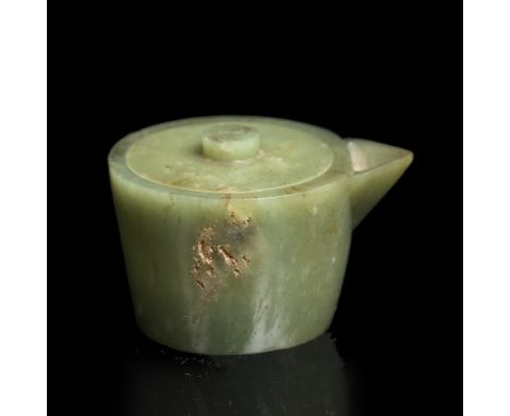 A Chinese leaf green jade water dropper 19th Century carved as a bird, beaked beaker and cover, the latter with a Yin-Yang kn