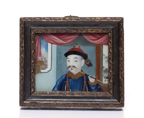 A Chinese miniature reverse glass painting 19th Century depicting the head and shoulders of gentlemen smoking an opium pipe, 