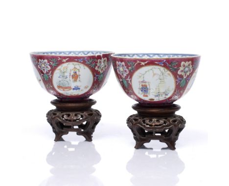 A pair of Chinese medallion bowls 19th Century decorated with four medallions depicting flower vases and "antiques" divided b