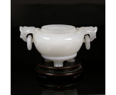 A fine Beijing white glass emulating jade two handled ting 19th Century the squat rounded body with moulded Dog of Fo handles