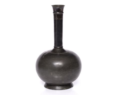 An Indian bidri flask late 18th Century Deccan, inlaid with silver to the neck, 25.75cm high