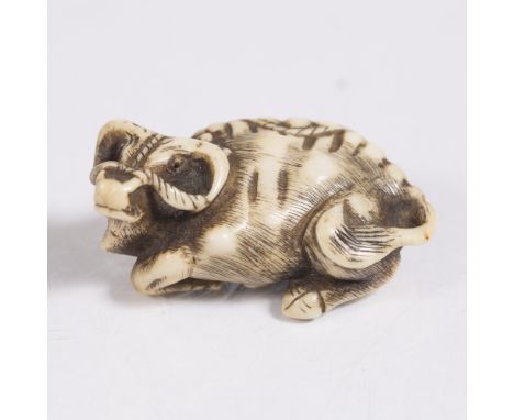 A Japanese bone netsuke of a reclining ox Meiji with rope halter, Kyoto style, 6cm long