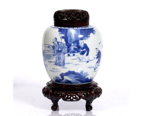 A Chinese blue and white ginger jar 18th/19th Century with boys playing in a garden, with hardwood cover and stand