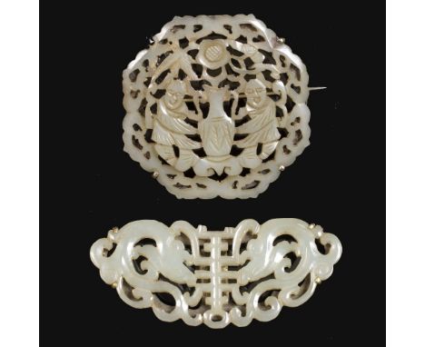 A Chinese white jade plaque 19th Century pierced and carved with a Shou character in Zhuanshu script, each side with chi lin 