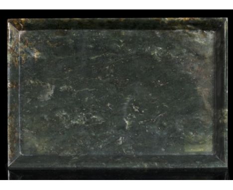 A Chinese spinach jade rectangular tray 19th Century with Qianlong four character seal mark, 29.5cm x 20.5cm